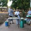 In the early morning, 2 Vietnamese nuns are preparing the breakfast for all IBC student at the road side of our Library building.
